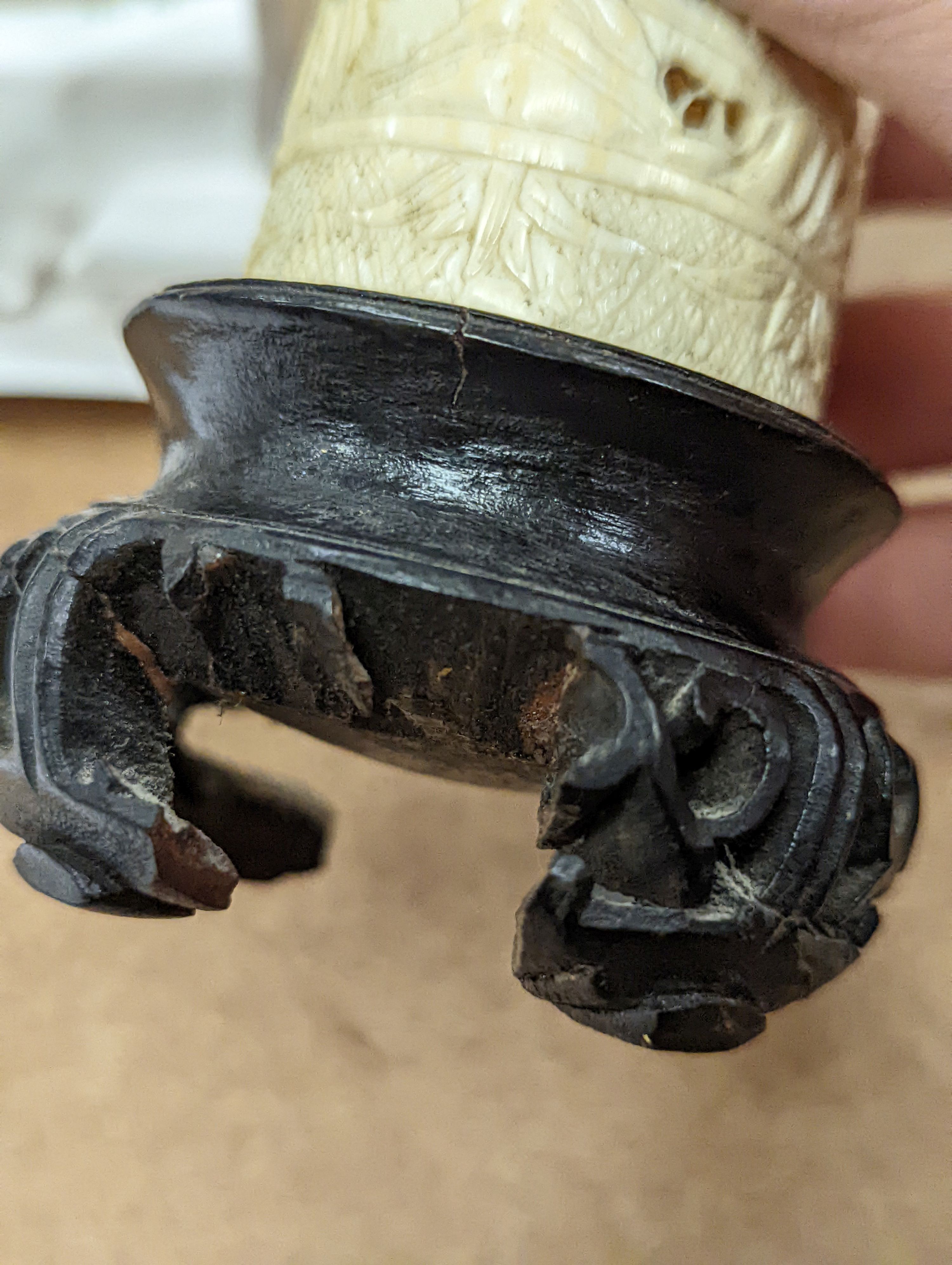 A pair of 19th century Chinese carved ivory brushpots on wooden stands - 12cm tall (including stands)